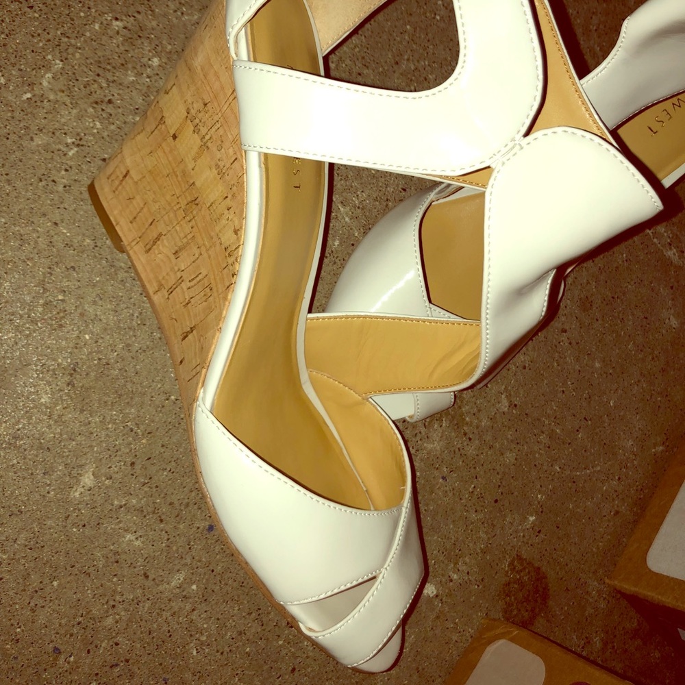 Nine West gently used White wedges.....